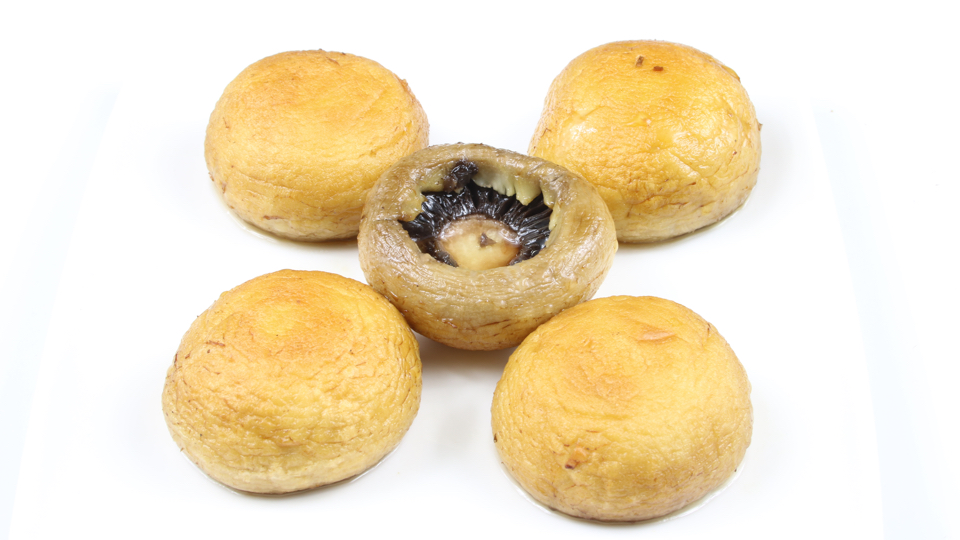 Uitgeholde en gebakken champignons
