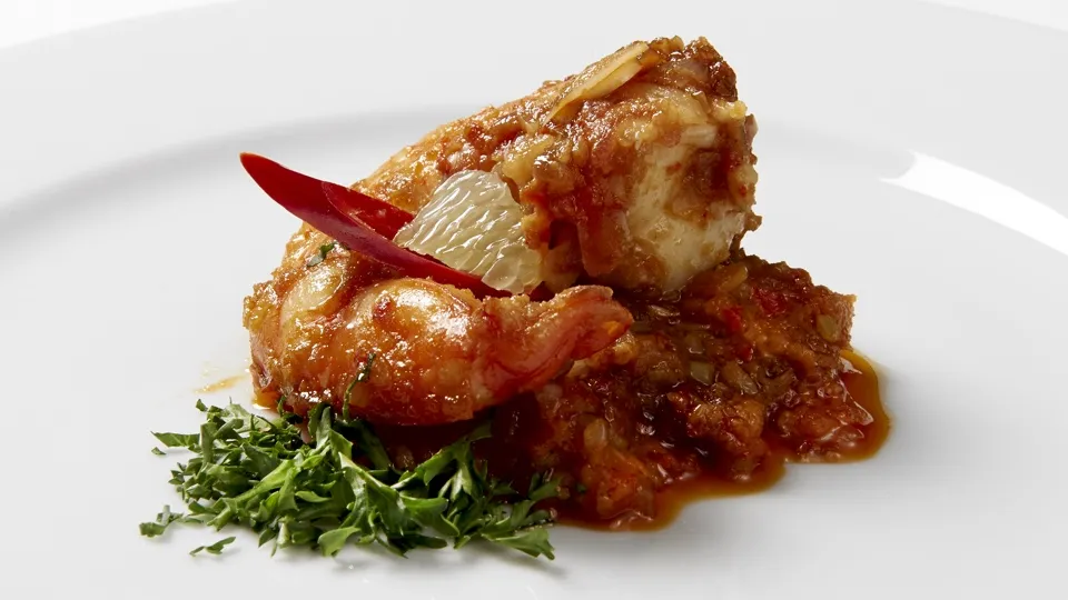 UDANG BASE BAJAK Udang Base Bajak: grote garnaal in pittige saus van sambal bajak met tomaat